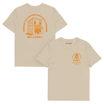 Two beige short-sleeve t-shirts shown on a white background, displaying the front and back designs. The back features a large orange graphic of a diner with the text 'SERVING THE FAMOUS NASHVILLE BUNGER' and 'BRIT & BRIDLE' below.