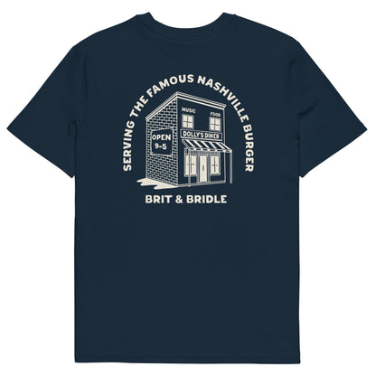 A white short-sleeve t-shirt with a large white graphic print on the back. The graphic features an illustration of a diner building with the text 'SERVING THE FAMOUS NASHVILLE BUNGER' arched above it and 'BRIT & BRIDLE' printed below.