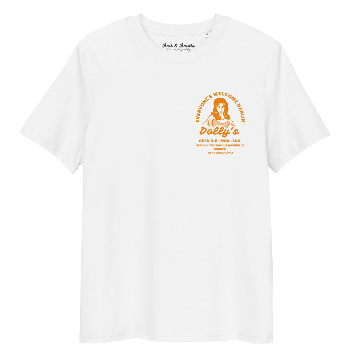 A white short-sleeve crewneck t-shirt with a vintage-style orange graphic on the left chest. The graphic features a stylized portrait of Dolly Parton with the text 'Everyone's Welcome at Dolly's' and 'Dolly's Open 9-5 Mon-Sun'.